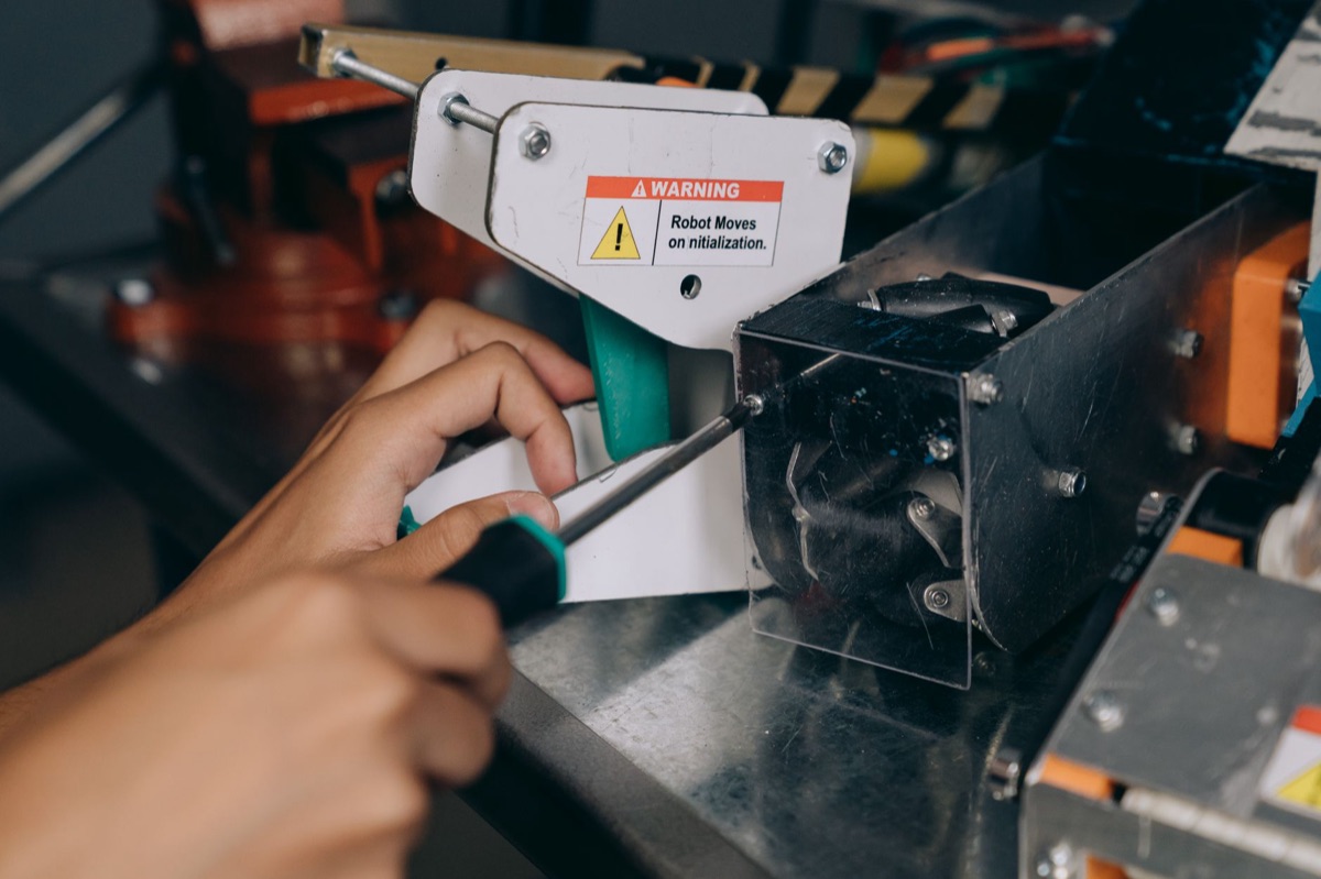 robotic arm with wrench and diagnostic tool